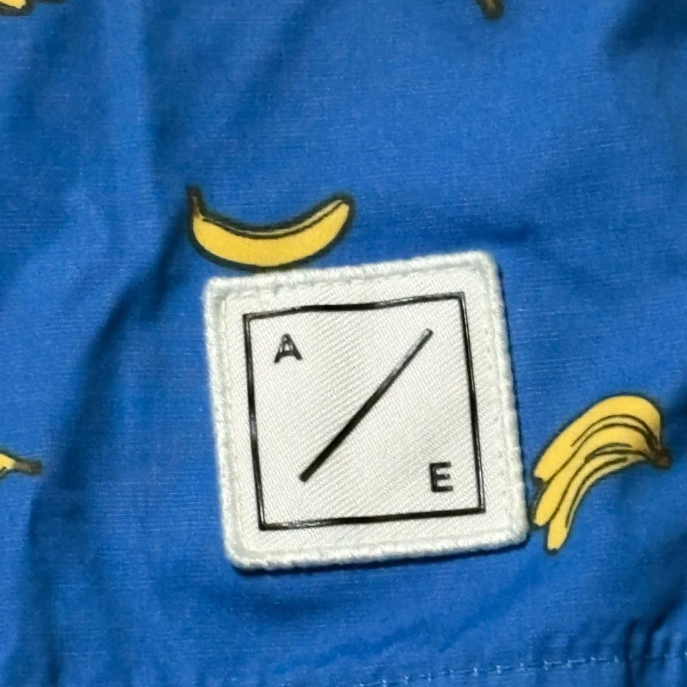 American Eagle Board Shorts Men’s Medium‎ Blue with Banana print drawstring